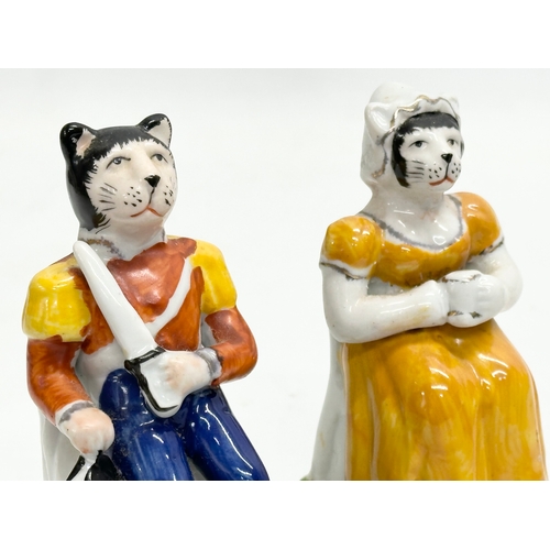 219 - A pair of rare Late 19th Century Victorian Staffordshire pen holders. 12.5cm.