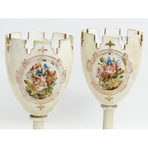 220 - A pair of Late 19th Century hand painted Bohemian glass goblet style vases. 28cm.