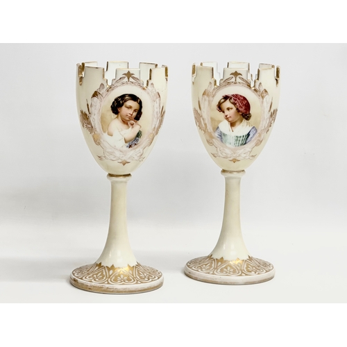 220 - A pair of Late 19th Century hand painted Bohemian glass goblet style vases. 28cm.