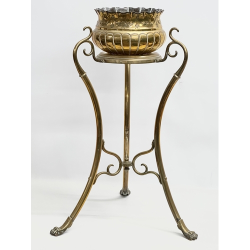 30 - William Soutter and sons. A Late 19th Century Art Nouveau brass jardiniere on stand. 46x46x70cm.