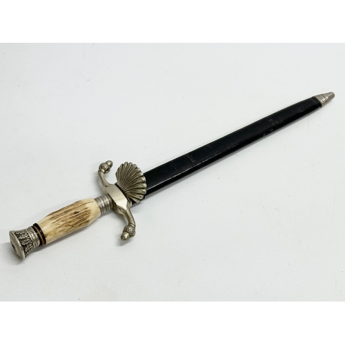 229 - A German hunting dagger with horn handle. 38cm