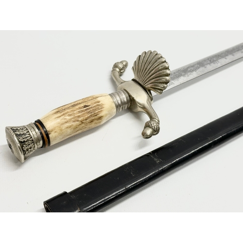 229 - A German hunting dagger with horn handle. 38cm