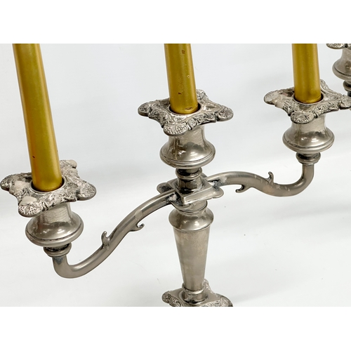 251 - A pair of good quality Early 20th Century silver plated candelabras. 28x26cm.