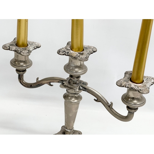 251 - A pair of good quality Early 20th Century silver plated candelabras. 28x26cm.