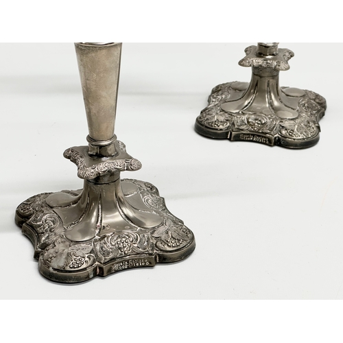 251 - A pair of good quality Early 20th Century silver plated candelabras. 28x26cm.