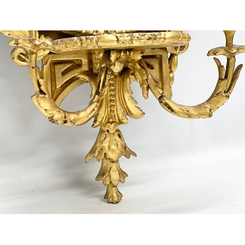 14 - An Early 19th Century Regency gilt framed Girandole mirror. Circa 1810. 49x94cm