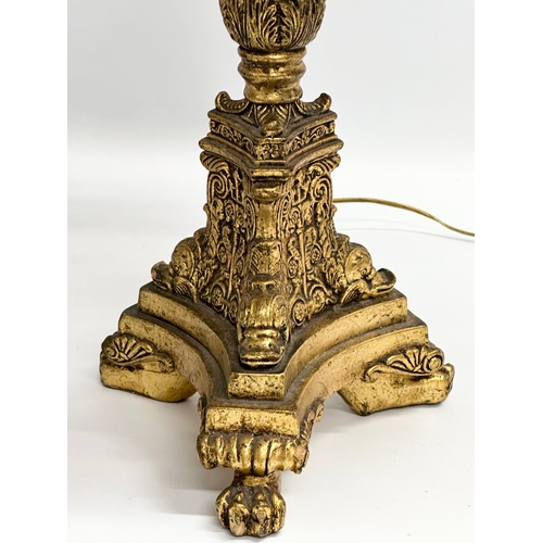 245 - A Mid 20th Century French Empire style gilt table lamp. 71cm