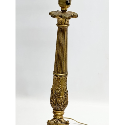 245 - A Mid 20th Century French Empire style gilt table lamp. 71cm