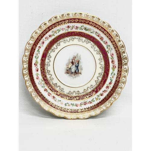 253 - A pair of Early 20th Century Rococo hand painted cups and saucers.