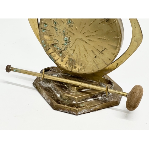 255 - A Late 19th Century Victorian brass gong on stand. 15x15x32cm.