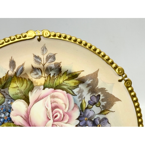 256 - Joseph A. Bailey (1937-1974) a signed Aynsley pottery hand painted gilt rimmed cabinet plate. Design... 