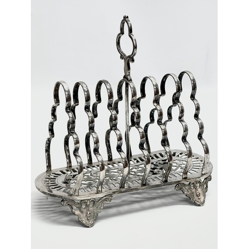 262 - A collection of 19th and 20th Century silver plate. 3 tier cake stand. Toast rack, 4 piece tea servi... 