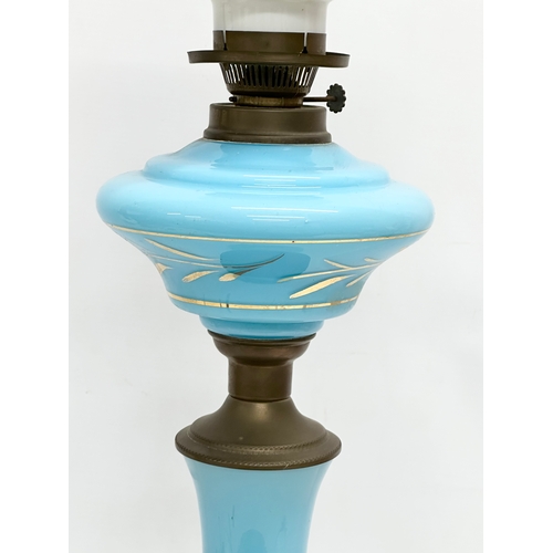 265 - A large Late 19th Century French opaline glass oil lamp. 71cm