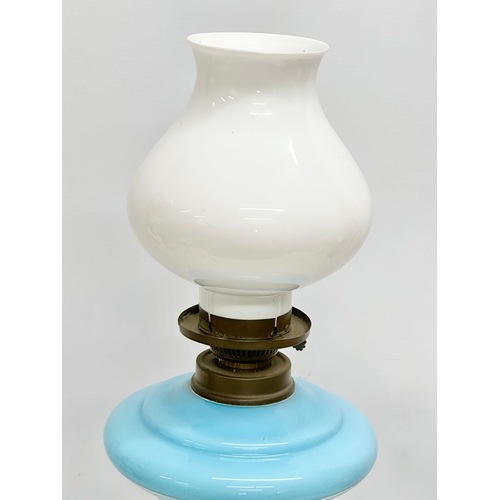 265 - A large Late 19th Century French opaline glass oil lamp. 71cm