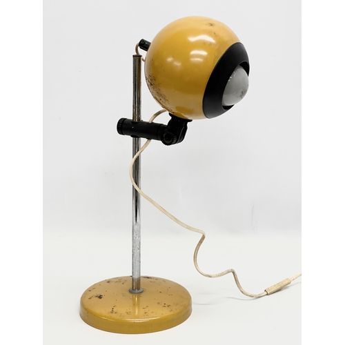 117G - Veneta Lemi. An Italian Mid Century Space Age rise and fall desk lamp. Fully extended 55cm.