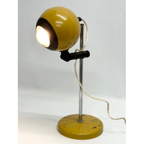 117G - Veneta Lemi. An Italian Mid Century Space Age rise and fall desk lamp. Fully extended 55cm.