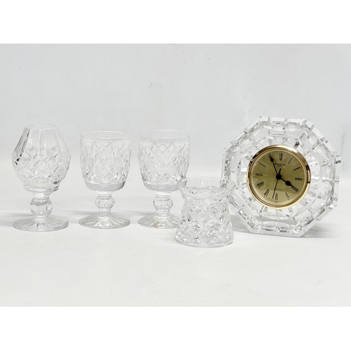 586 - A collection of Waterford Crystal. Clock measures 13x13cm.