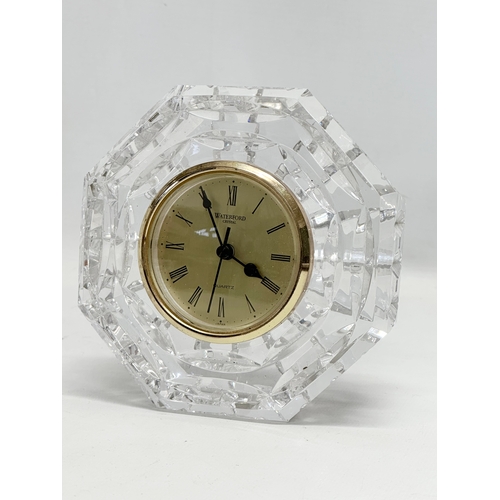 586 - A collection of Waterford Crystal. Clock measures 13x13cm.