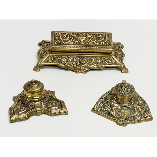 329 - 3 Late 19th and Early 20th Century brass desktop items. A brass desktop stamp holder. A Victorian Pe... 