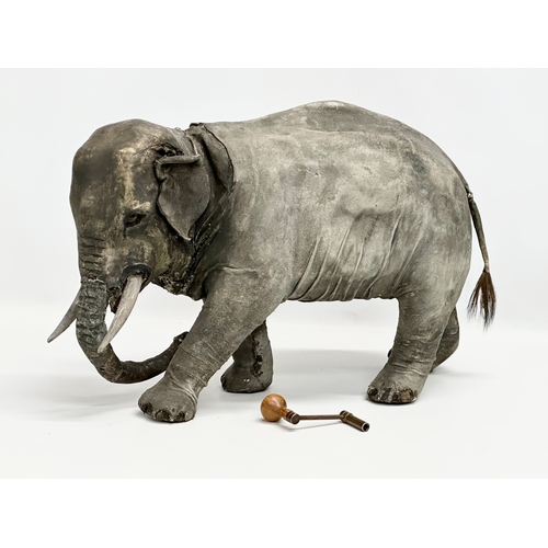 11 - A rare Late 19th Century Roullet & Decamps automaton elephant. 1880’s. With winder. 51x33cm.