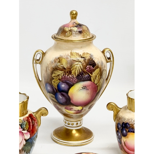 346 - A collection of Aynsley ‘Orchard Gold’ including a signed urn with lid by D. Jones 14x23cm. An N. Br... 