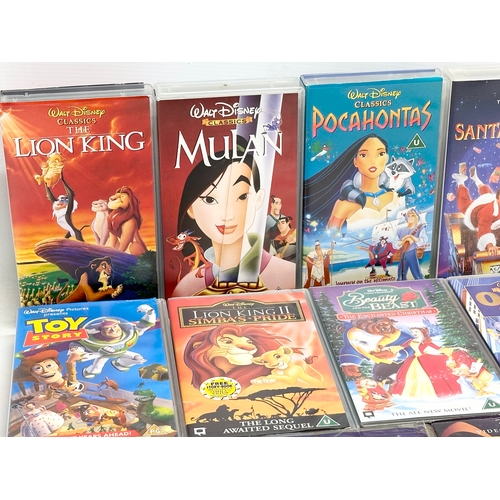 583 - A collection of Disney VHS tapes.