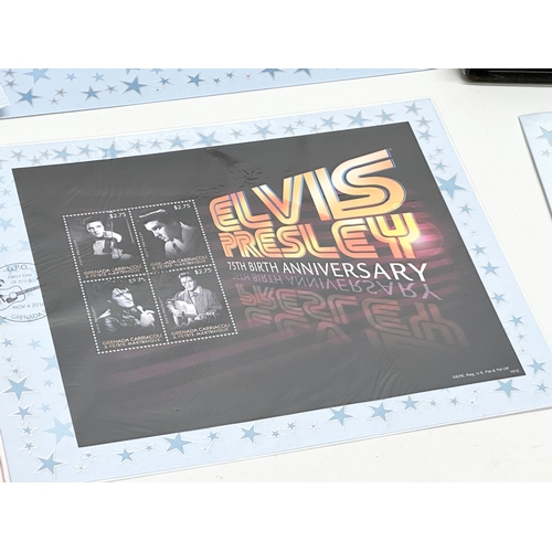 584 - A collection of Elvis Presley memorabilia. Including VHS tapes and stamps etc.