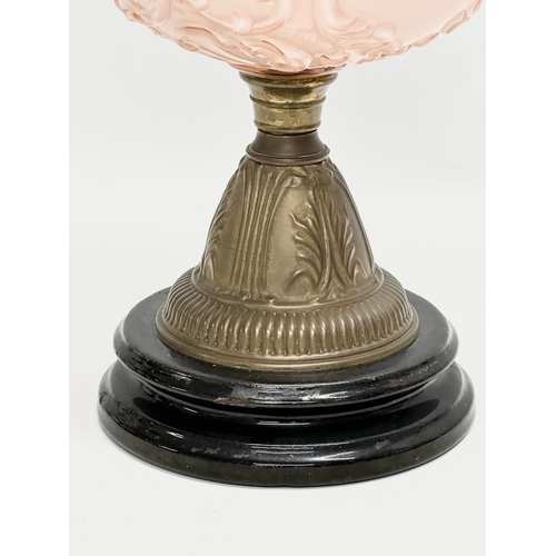 353 - A Victorian double burner oil lamp with glass bowl and an Early 20th Century shade. 58cm