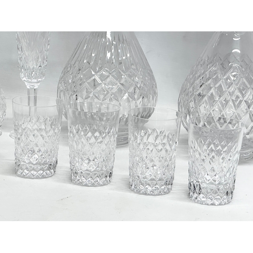 572 - A collection of Tyrone Crystal. 2 Tyrone decanters, 2 pairs of Tyrone wine glasses. Tyrone brandy gl... 