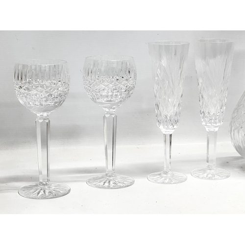 572 - A collection of Tyrone Crystal. 2 Tyrone decanters, 2 pairs of Tyrone wine glasses. Tyrone brandy gl... 