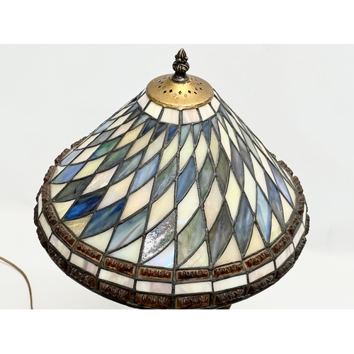 354 - An Early 20th Century speltre table lamp on marble base. With Tiffany style shade. 30x59cm