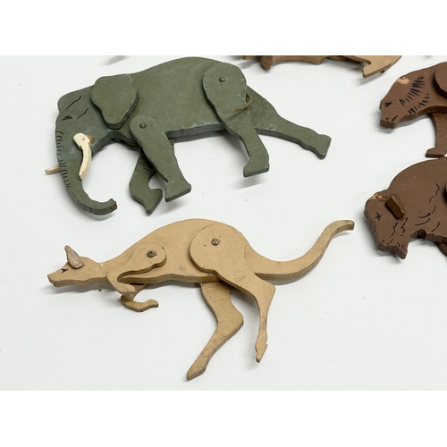 579 - A collection of vintage wooden animals. 17cm