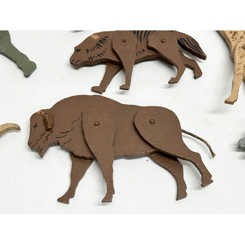 579 - A collection of vintage wooden animals. 17cm