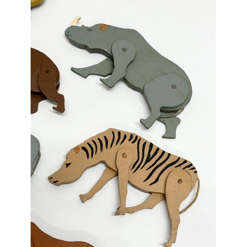 579 - A collection of vintage wooden animals. 17cm