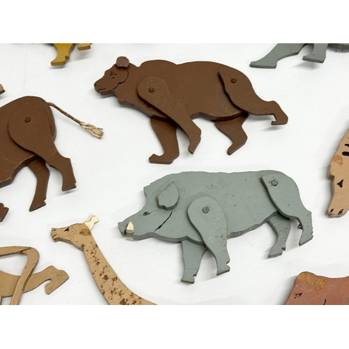 579 - A collection of vintage wooden animals. 17cm