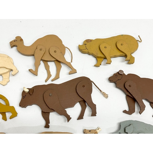 579 - A collection of vintage wooden animals. 17cm