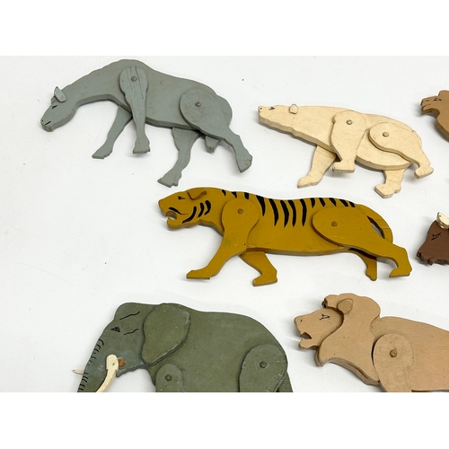 579 - A collection of vintage wooden animals. 17cm