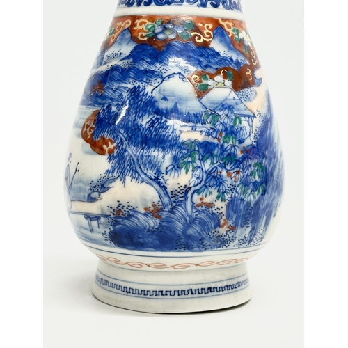 357 - A Japanese hand painted vase. Seto Keizai Kato. 10.5x22cm