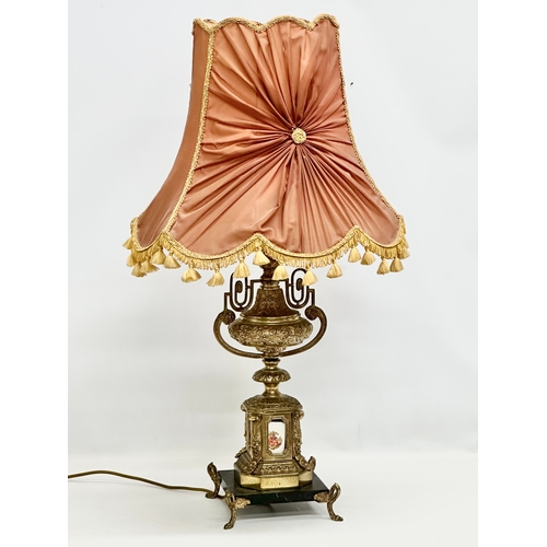 358 - A large Mid 20th Century French Empire style brass table lamp on slate base. Raised on 4 brass feet.... 