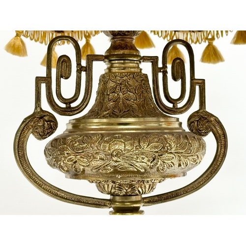 358 - A large Mid 20th Century French Empire style brass table lamp on slate base. Raised on 4 brass feet.... 