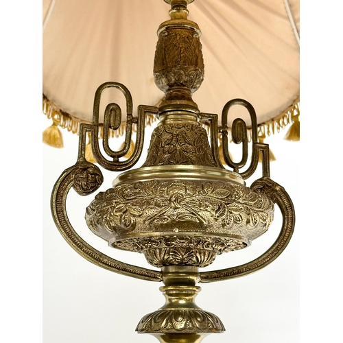 358 - A large Mid 20th Century French Empire style brass table lamp on slate base. Raised on 4 brass feet.... 