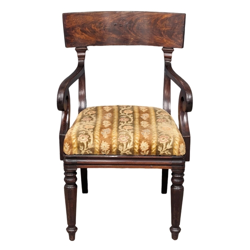 1179 - A George IV mahogany bar back armchair.(1)