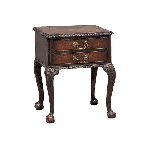 1182 - An Early 20th Century mahogany Chippendale Revival end table on Ball & Claw feet. 48x46x61cm