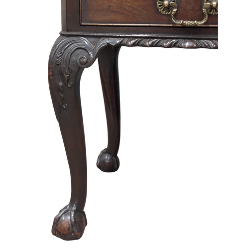 1182 - An Early 20th Century mahogany Chippendale Revival end table on Ball & Claw feet. 48x46x61cm