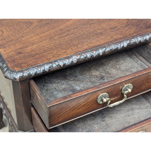 1182 - An Early 20th Century mahogany Chippendale Revival end table on Ball & Claw feet. 48x46x61cm