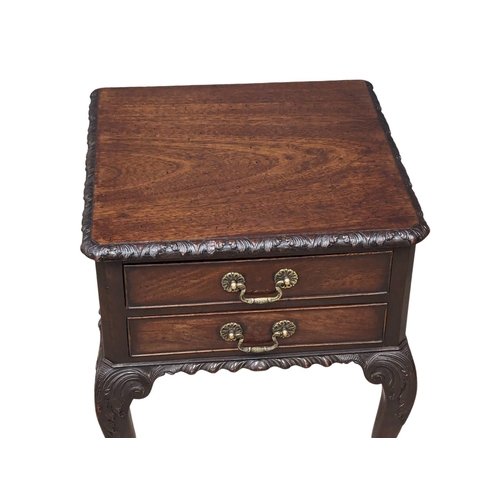 1182 - An Early 20th Century mahogany Chippendale Revival end table on Ball & Claw feet. 48x46x61cm