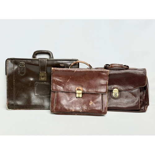 559 - 3 Early/Mid 20th Century leather satchels. 53cm. 42cm. 40cm