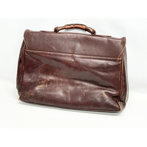 559 - 3 Early/Mid 20th Century leather satchels. 53cm. 42cm. 40cm