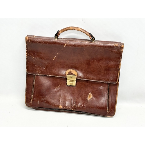 559 - 3 Early/Mid 20th Century leather satchels. 53cm. 42cm. 40cm