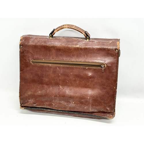 559 - 3 Early/Mid 20th Century leather satchels. 53cm. 42cm. 40cm